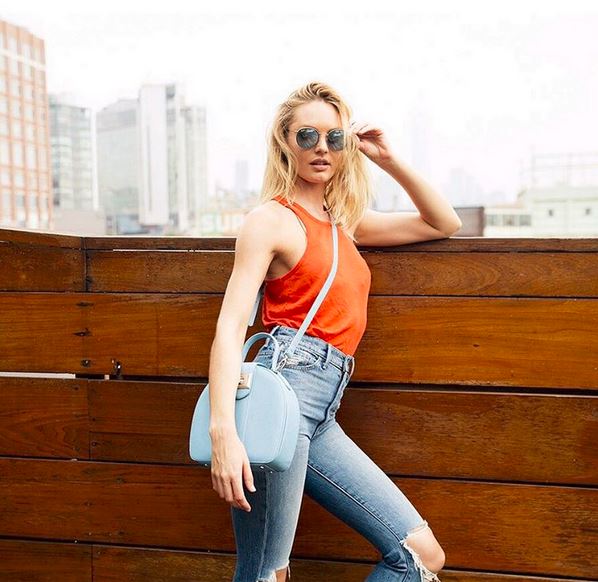 angel-candice-model-street-style-look-ripped-jeans-sky-blue-cross-body-bag-orange-tank-round-mirror-sunglasses