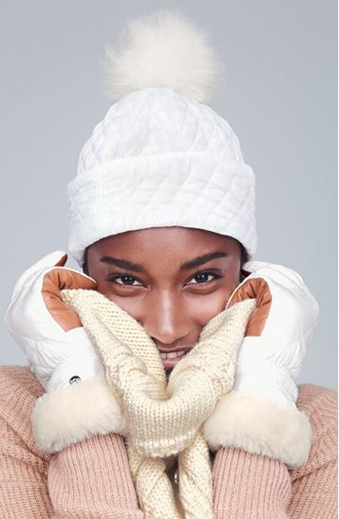 latest hat trends winter 2016 white quilted hat pom pom beanie ugg australia