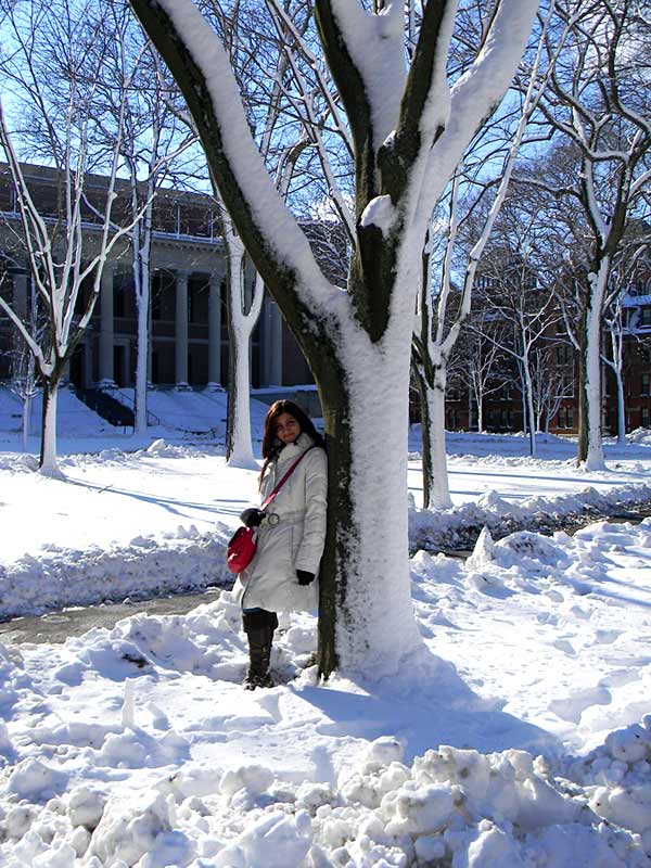 shilpa-ahuja-harvard-fashion-blogger-snow-white-coat-winter-jacket-outfit-boots-red-bag