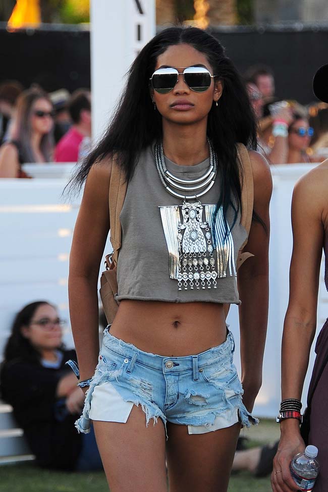 ** RESTRICTIONS: ONLY UNITED STATES, BRAZIL, CANADA ** Indio, CA - Indio, CA - Chanel Iman is spotted at Coachella Day 2. The Victoria's Secret model is wearing denim low rise shorts and a green crop top paired with a festive silver necklace and boots. AKM-GSI 16 APRIL 2016 To License These Photos, Please Contact : Maria Buda (917) 242-1505 mbuda@akmgsi.com or Steve Ginsburg (310) 505-8447 (323) 423-9397 steve@akmgsi.com sales@akmgsi.com