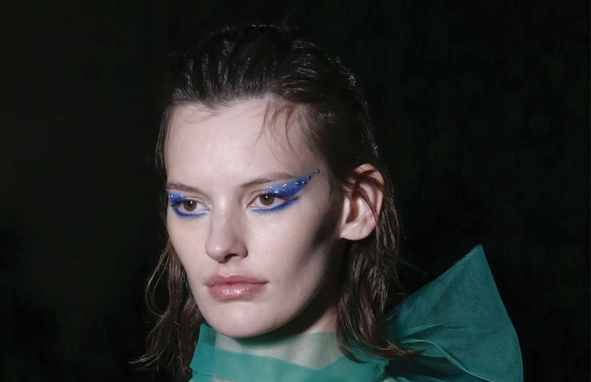 prada-fall-winter-2018-creative-makeup-looks-runway-beauty-hair-crystals-eyeshadow