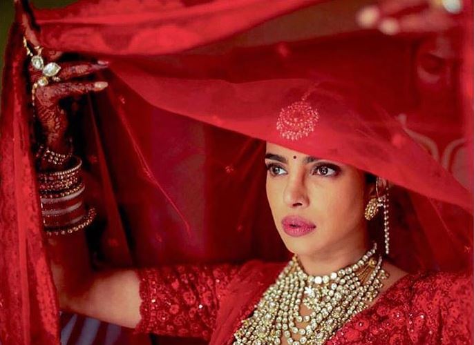 Priyanka Chopra wedding nick Jonas dulhan dress red lehenga designer