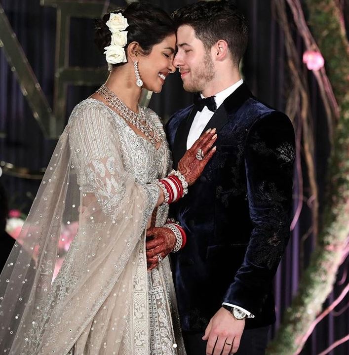 Priyanka Chopra nick Jonas wedding reception bollywood dress