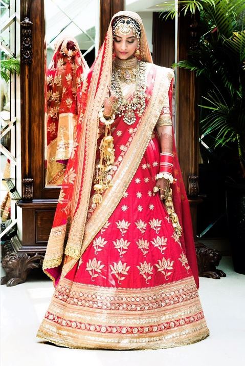 sonam kapoor ahuja red wedding pics bridal lehenga look dress